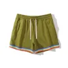 Mutande Costume da bagno Spiaggia Asciugatura rapida Tronchi per uomo Costumi da bagno Sunga Boxer Slip Pantaloncini Fast Dry Trunks Decorazione arcobalenoL231218