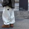 Pantaloni Abbigliamento per ragazzi 2023 Pantaloni invernali per bambini caldi casual in pile spesso stile coreano alla moda in stile coreano