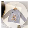 Les garçons et les filles portent une chemise à manches longues et à manches longues pour enfants de printemps et d'hiver T-shirt de marque de vêtements tendance taille 90-150 cm Drop de Dhvkj