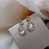 Boucles d'oreilles pendantes Vintage en pierre de lune claire pour femmes, couleur or, pierre ovale, cristal blanc, bijoux de fiançailles de mariage