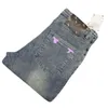 Calças de brim de designer masculino novo 2023 inverno rua jeans homens e mulheres impressas carta calças de algodão moda jeans roxo magro cintura média casual