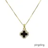 diamond inlaid Clover Necklace feminine temperament girls' advanced sense double-sided shell pendant clavicle chain