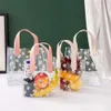 Ny julleksak leveranser 1pc transparent pvc gåva tote förpackning väska klara tusensköna plasthandväska godislåda presentväska bröllopsfest leveranser kosmetisk väska