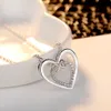 Collares de diamantes Colgante Coreano Nuevo Doble Color Amor Mujer Simple y de moda Cadena para el cuello en forma de corazón Rosa blanca Cerradura Cadena de hueso Regalo de Navidad