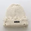 Gorro apenado rasgado personalizado del punto de acrílico suave del invierno de Streetwear de la orden a granel de las boinas para los hombres