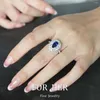 Cluster Rings ForHer Arrivo a forma di pera Royal Sapphire Gemstone Lab Diamond Stud Set di gioielli Regali per le donne Moda