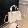 2023 Sacs de créateurs de haute qualité Sacs à bandoulière en cuir souple Mini Femmes Sac à main Bandoulière Luxe Fourre-tout Mode Shopping Multi-Color Purse Satchels Bag111