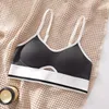 Tenue de yoga Soutien-gorge de sport pour femmes avec petits seins Push-up Beau dos montrant une grande résistance sans jantes