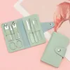 Kit per nail art Cura 7 pezzi Taglierina Forbici Pinzette Clipper Kit per pedicure manicure Set con custodia in pelle PU colorata