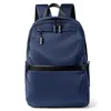 Torby szkolne styl biznesowy plecak nylon solidny kolor duża pojemność studencka szkolna podróżna plecak w sprzedaży dla mężczyzn 231219