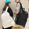 Sacs d'école grande capacité en cuir PU femmes sac à dos hommes Cool voyage sac à dos haute qualité école sac à dos pour filles livre Mochilas Couple 231219