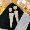 Dangle Chandelier Classic Crystal Earrings سيدات مبالغ فيها الأقراط الطويلة شرابات أقراط راينستون الأزياء السيدات الكورية من المجوهرات المجوهرات 231219