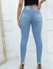 Jeans da donna Matita sottile da donna Moda con fori rotti Scava fuori pantaloni in denim con bottoni inclinati a vita alta Pantaloni elasticizzati casual femminili