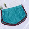 Cuecas masculinas roupa interior sólida u convexo cintura baixa elástica respirável malha solta boxers calcinha casual esporte shorts para interior