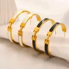 New Arrival Gold Plated Stainless Steel Hoop Designer Jewelry Famous Brands Letter Cuff Earrings for Women.