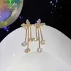 Dangle żyrandol Nowe pełne kryształowe kolczyki z bręgami dla kobiet dla kobiet Earing biżuteria premium moda koreańska wróżka kropli kolczyki partyl231219