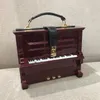 Borse da sera borse e borsette per donna Borsa a tracolla a tracolla di design di lusso a forma di pianoforte borse con manico superiore Borsa a tracolla 231219