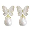 SINZRY prachtige gesimuleerde parel kubieke zirkoon vlinder bloem sieraden accessoire trendy bungelende oorbellen voor vrouwen 210624204Q