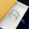 デザイナーフープイヤリングチタニウムスチールビッグフープイヤリング韓国版の気質