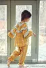 Pyjamas Ensembles de pyjama à carreaux à manches longues en coton pour garçon et fille mignonne. Ensemble de pyjama pour enfants en bas âge.