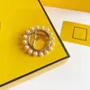 18 -karatowe złote broszki piny okrągłe perłowe diamentowe broszki klasyczne modne broszka luksusowa marka klejnotów dobra jakość brosze249y