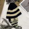 Viviene Westwoods Cap Viviennewestwood Zhenyi Cartoon West Empress Dowager Saturn Hat Female Tassel Show Face Small Ear Protection Knitted Wool Lei Feng H