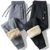 Pantalones de hombre de lana de cordero de invierno cálidos informales Fiess pantalones de chándal para correr pantalones sólidos con cordón pantalones rectos de lana M-5xl