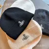 Designer Viviene Westwoods Cap Viviennewestwood Autumn and Winter Woolen Knitted Hat Saturn West Empress Dowager's Versatile and Trendy Warm Cold Hat for Couples