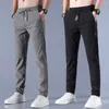 Pantalones para hombres Malla Seda de hielo Primavera y verano Suelto Tamaño grande Paquete Pie Deportes Fino Transpirable Nueve minutos Casual