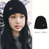 Wang Ziwen, une célébrité avec le même pull chaud à capuche tricotée avec le même logo M, chapeau froid polyvalent pour enfants d'automne et d'hiver célèbre sur Internet