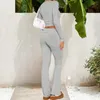 Pantaloni a due pezzi da donna Top a maniche lunghe da donna Set svasato O-Collo Crop e set a vita bassa Slim Fit Tinta unita Primavera Autunno Wear