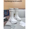 Nouveau 24SS luxe tube long bottes en caoutchouc designer femmes semelles épaisses tête ronde slip semelles épaisses marque de mode polyvalent haute tube pluie bottes pour femmes