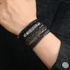 Charmarmband vintage trendiga läder armband män pu vävt metall mönster pull rep smycken