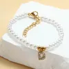 Bracelets de charme 5pcs Fashion Zircon Iniciais Pérolas PARAGEM PARA PARTILHA AÇO ANTECIMENTE 26 LENA DE PARA LETRA inicial para mulheres