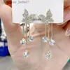 Dangle żyrandol Nowe pełne kryształowe kolczyki z bręgami dla kobiet dla kobiet Earing biżuteria premium moda koreańska wróżka kropli kolczyki partyl231219