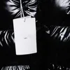 女性のダウンコットンジャックパーカーデザイナー秋と冬のレタープリントデザインファッショナブルなセーターロングコートバージョンダウンジャケット