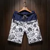 Mäns shorts 2023 Sommarn New Men's Bermuda Shorts Lose bekväm rak blommor Hawaiian Comfort Linen Shorts Men Brandl231218