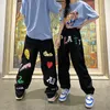 Men's Jeans Fashion Streetwear Men Baggy Hip Hop Black Star Alphabet Graffiti Loose Casual Wide Leg Pants Woman Denim Trousers 231219