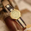 Women's high quality luxury fashion snakeskin strap waterproof quartz watch