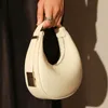 Kvällspåsar Spring Halfmoon Bag for Women Pu Leather Axel Simple Style Underarm Designer Gilrs Armpit Handväska och handväska SAC 231219