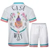 Casablanc skjorta designer mens t shirt och mesh shorts set casa blanca män polo skjorta kvinnor masao san tryck grafiska tee skjortor lösa siden sommar tshirts kläder 36 326