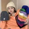 カタツムリクロールホームウェブサイトレッドPレターウール女性ウィンター韓国版学生が編み込まれた冷たい温かい帽子の子供