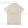 Polos pour hommes Summer 2024 T-shirt de créateur de revers T-shirt T-shirt LETTRE Classique à manches courtes Khaki Blue Patchwork Gold Button Coton Coton Tshirt Tee Tops Shirt Ee Ops