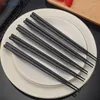 Chopsticks 1 par legering kinesiska japanska sushi pinnar återanvändbara non glid diskmaskin säker bambuform klass