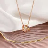 Colliers de créateurs en or rose, en titane, pour femmes, pendentif romain de haute qualité, chaîne cadeau