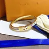 Designer -Marken -Armbänder Frauen Bangle Luxus Designer Brief Armband 18K Gold plattiert Edelstahlarmband Frauen Hochzeit JE275c