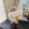 Fashion designer Leather Handbags luxury 2023 New Mini Saddle Bag Versatile One Shoulder HandheldWith original Logo