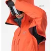メンズデザイナーアクティブウェアアークテイズフーディージャケットコート女性用防水耐摩耗性オレンジ色のフード付き屋外スプリンタージャケット用