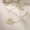 Collier ras du cou pour femmes, perle d'imitation, fleur cloutée avec strass, chaîne de clavicule scintillante, mode bohème, accessoires pour femmes