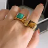 Anello da donna Anello in pietra naturale squisito e creativo con occhio di tigre Anello in acciaio inossidabile placcato con regalo di gioielli di moda in oro 18 carati